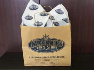 A bag of food with the logo for mounties beer store.