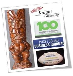 A wooden statue is next to a business journal.